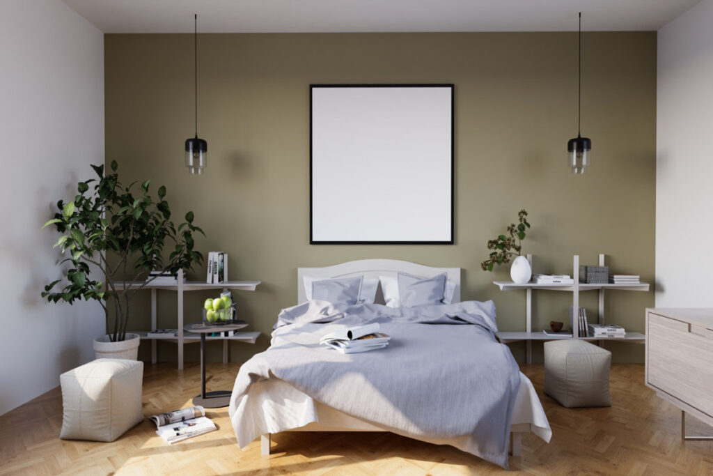 Chambre aux teintes douces, mur vert sauge et textiles clairs pour une ambiance apaisante