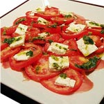 Carpaccio de jambon de montagne, tomates, mozzarella Carpaccio de jambon de montagne, tomates, mozzarella