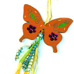 Une pampille papillon en médium Une pampille papillon en médium